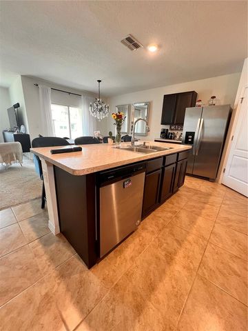1267 IGUANA LOOP, Davenport, FL 33897