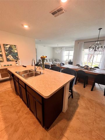 1267 IGUANA LOOP, Davenport, FL 33897