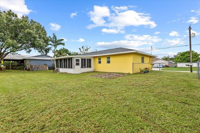 393 NW Curtis Street, Port St Lucie, FL 34983