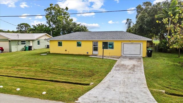 393 NW Curtis Street, Port St Lucie, FL 34983