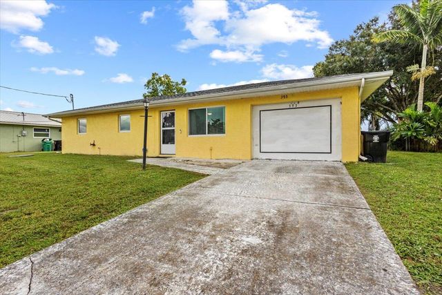 393 NW Curtis Street, Port St Lucie, FL 34983