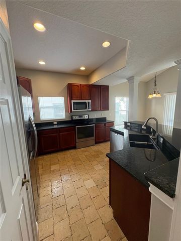 6931 LUCCA STREET, Orlando, FL 32819