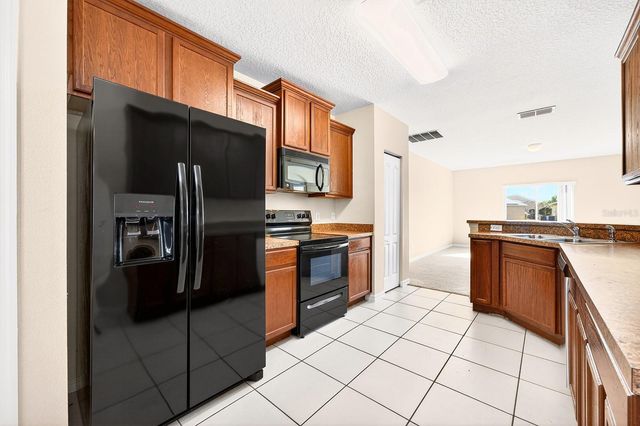 3210 QUEEN ALEXANDRIA DRIVE, Kissimmee, FL 34744