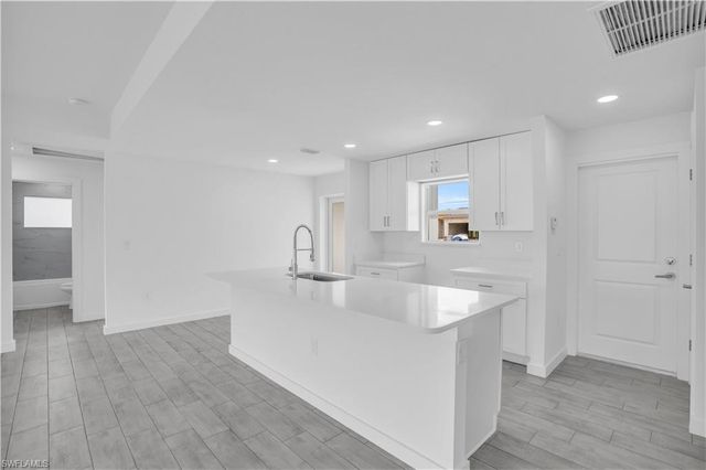3315 7th ST SW, Lehigh Acres, FL 33976