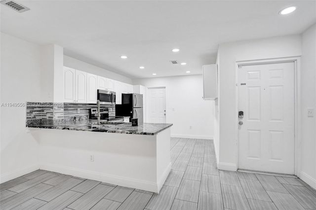 4183 Crystal Lake Dr, Deerfield Beach, FL 33064