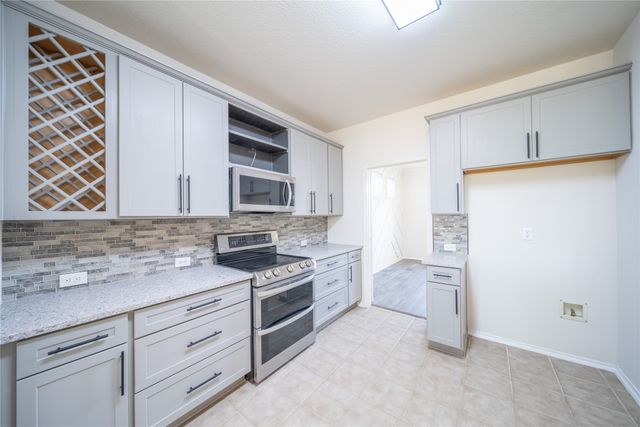 9601 Links Fairway Drive, Rowlett, TX 75089