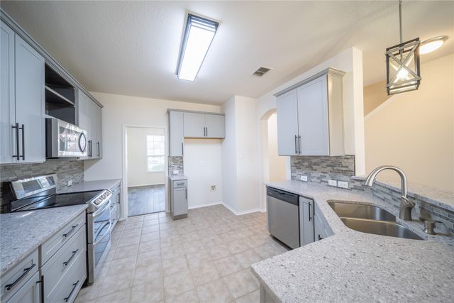 9601 Links Fairway Drive, Rowlett, TX 75089