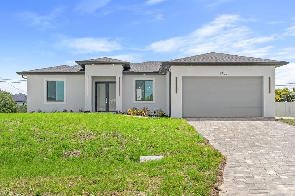 Image 1 of property listing at 1433 NW 7th PL, Cape Coral, FL 33993