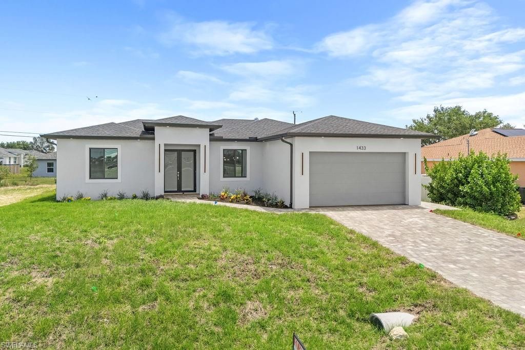 Image 2 of property listing at 1433 NW 7th PL, Cape Coral, FL 33993