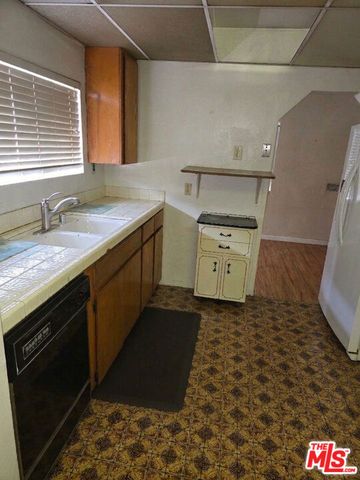 9414 Clovis Avenue, Los Angeles, CA 90002