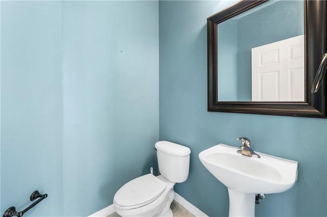 1703 Sarazen PL, Naples, FL 34120