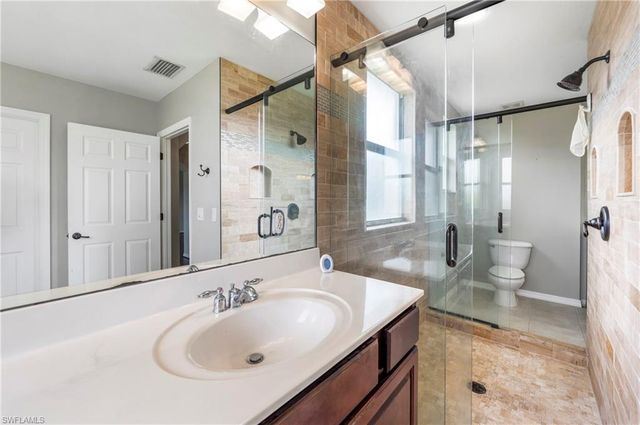 1703 Sarazen PL, Naples, FL 34120
