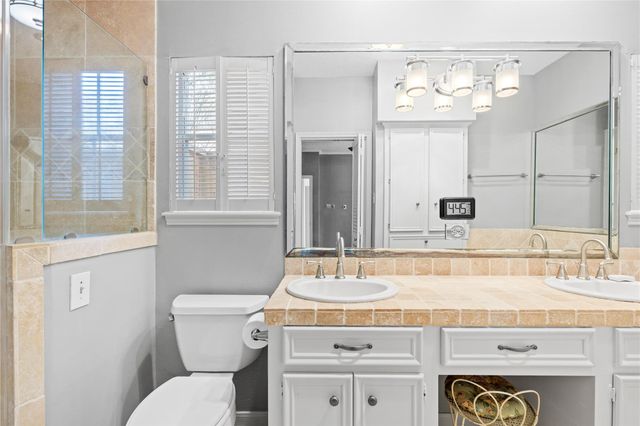 8 Wild Ginger Court, Spring, TX 77380