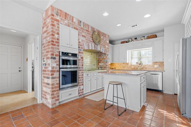 8 Wild Ginger Court, Spring, TX 77380