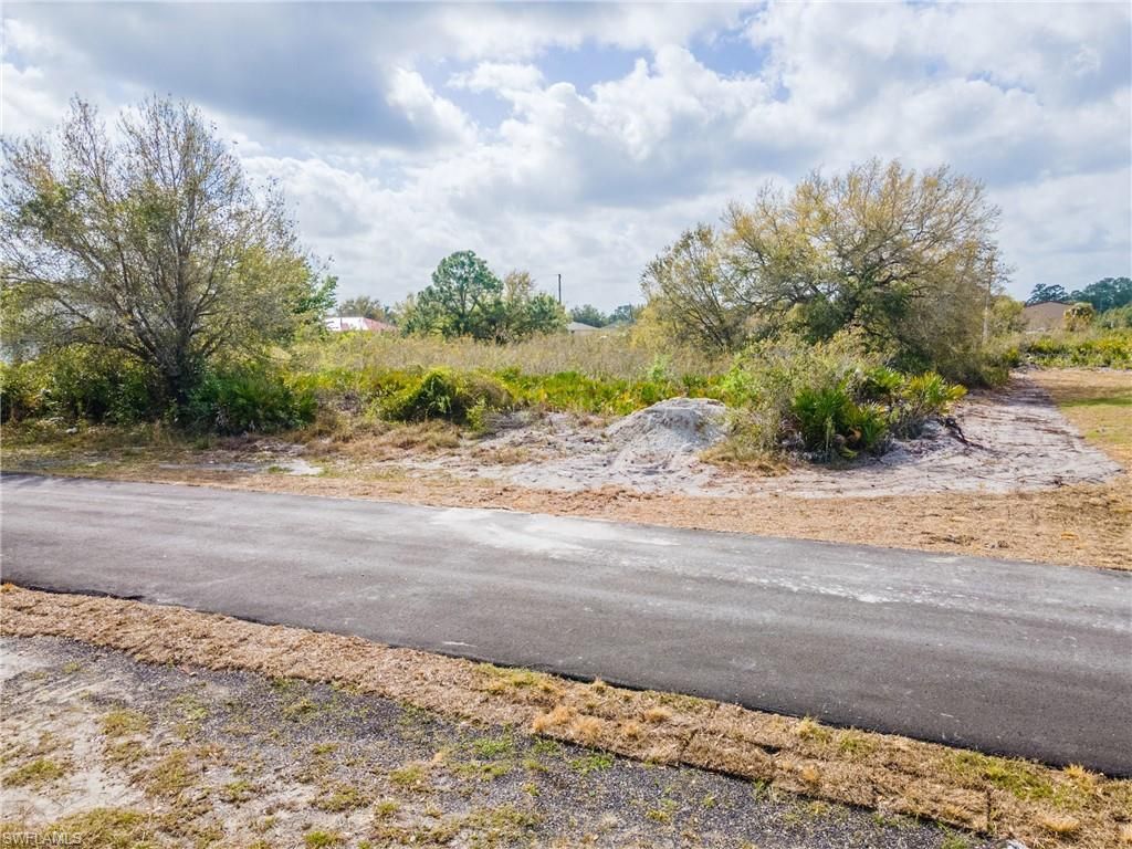 2521 57th ST W, LEHIGH ACRES, FL 33971 — exterior