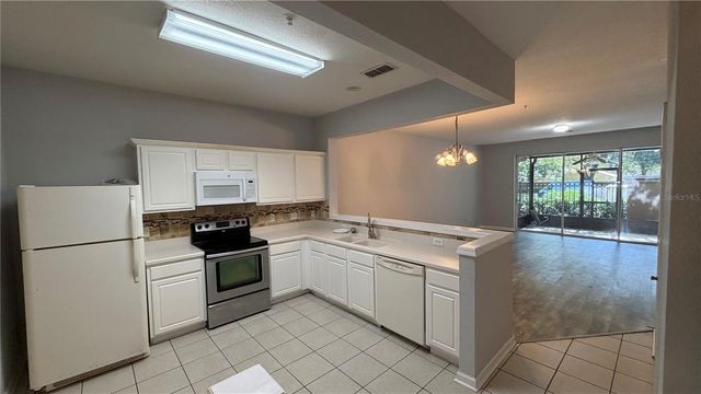 3336 SHALLOT DRIVE 104, Orlando, FL 32835