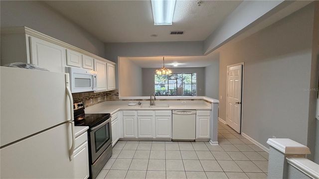 3336 SHALLOT DRIVE 104, Orlando, FL 32835
