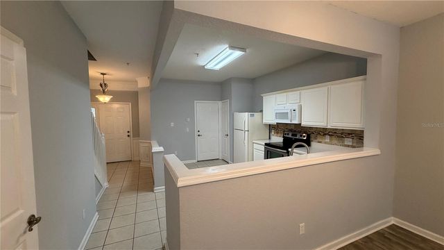 3336 SHALLOT DRIVE 104, Orlando, FL 32835
