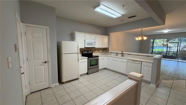 3336 SHALLOT DRIVE 104, Orlando, FL 32835