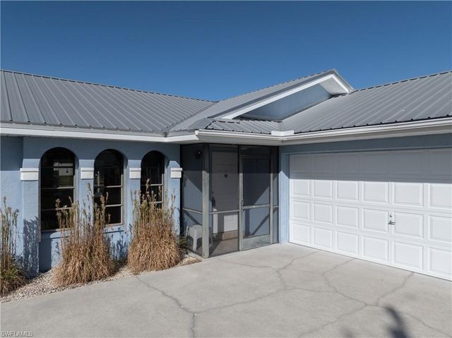 1402 SW 4th AVE, Cape Coral, FL 33991