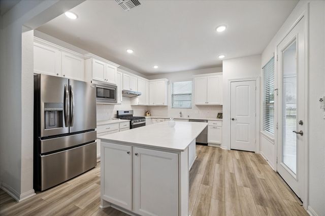 9911 Monarch Landing Cove, Willis, TX 77318