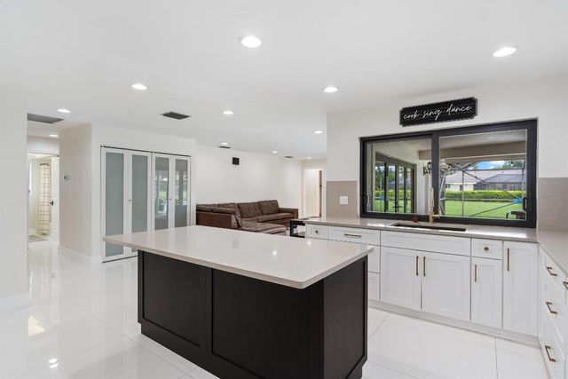 516 Muirfield Drive, Atlantis, FL 33462