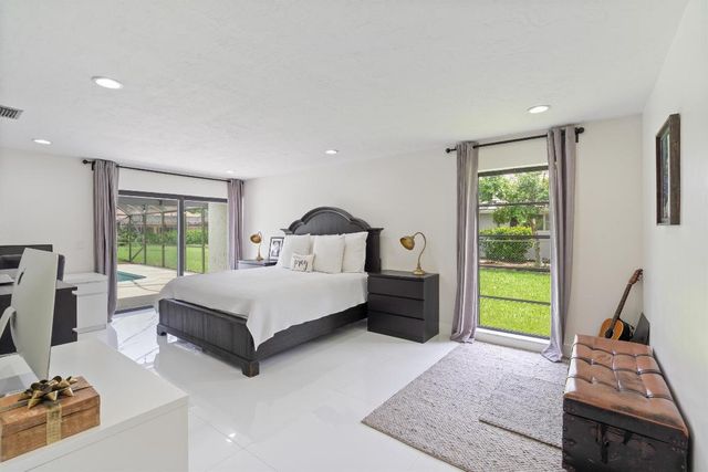 516 Muirfield Drive, Atlantis, FL 33462