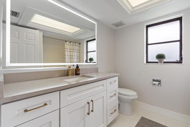 516 Muirfield Drive, Atlantis, FL 33462