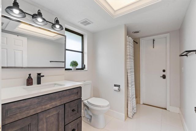 516 Muirfield Drive, Atlantis, FL 33462