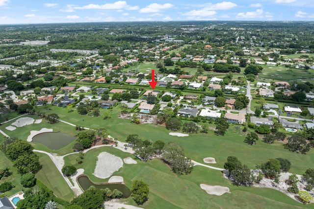 516 Muirfield Drive, Atlantis, FL 33462