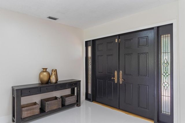 516 Muirfield Drive, Atlantis, FL 33462