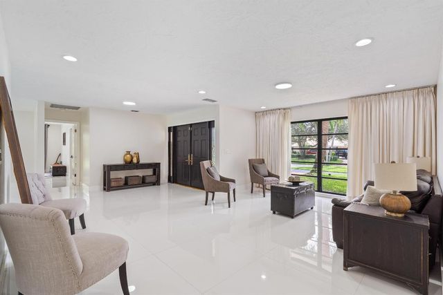 516 Muirfield Drive, Atlantis, FL 33462