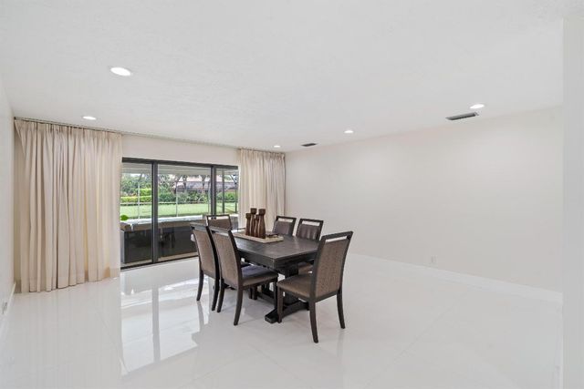 516 Muirfield Drive, Atlantis, FL 33462