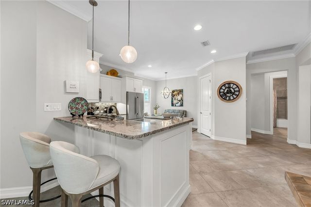 6589 Roma WAY, Naples, FL 34113