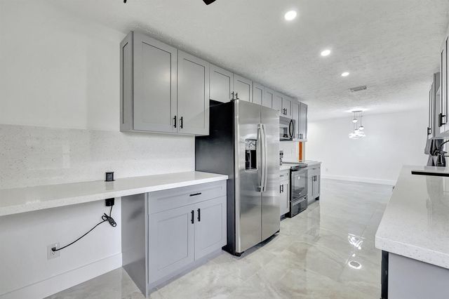1124 SE Ladner Street, Port St. Lucie, FL 34983