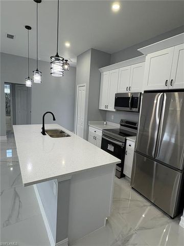 937 Sentinela BLVD, Lehigh Acres, FL 33974