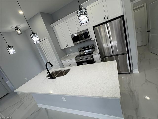 937 Sentinela BLVD, Lehigh Acres, FL 33974