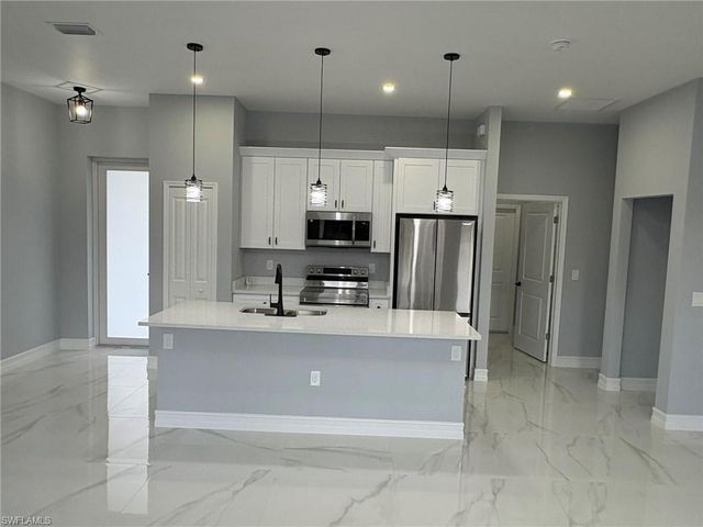 937 Sentinela BLVD, Lehigh Acres, FL 33974