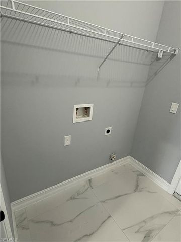 937 Sentinela BLVD, Lehigh Acres, FL 33974