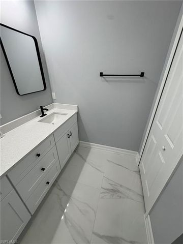 937 Sentinela BLVD, Lehigh Acres, FL 33974