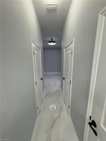 937 Sentinela BLVD, Lehigh Acres, FL 33974