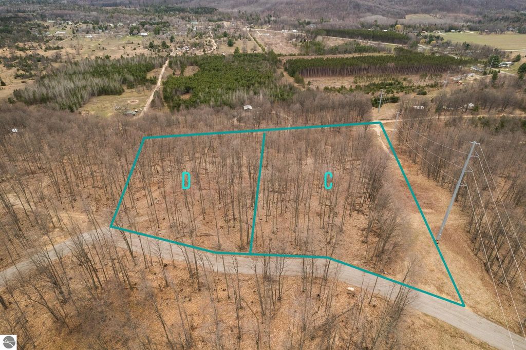 Image 3 of property listing at Lot D Retreats Way, Rapid City, MI 49676