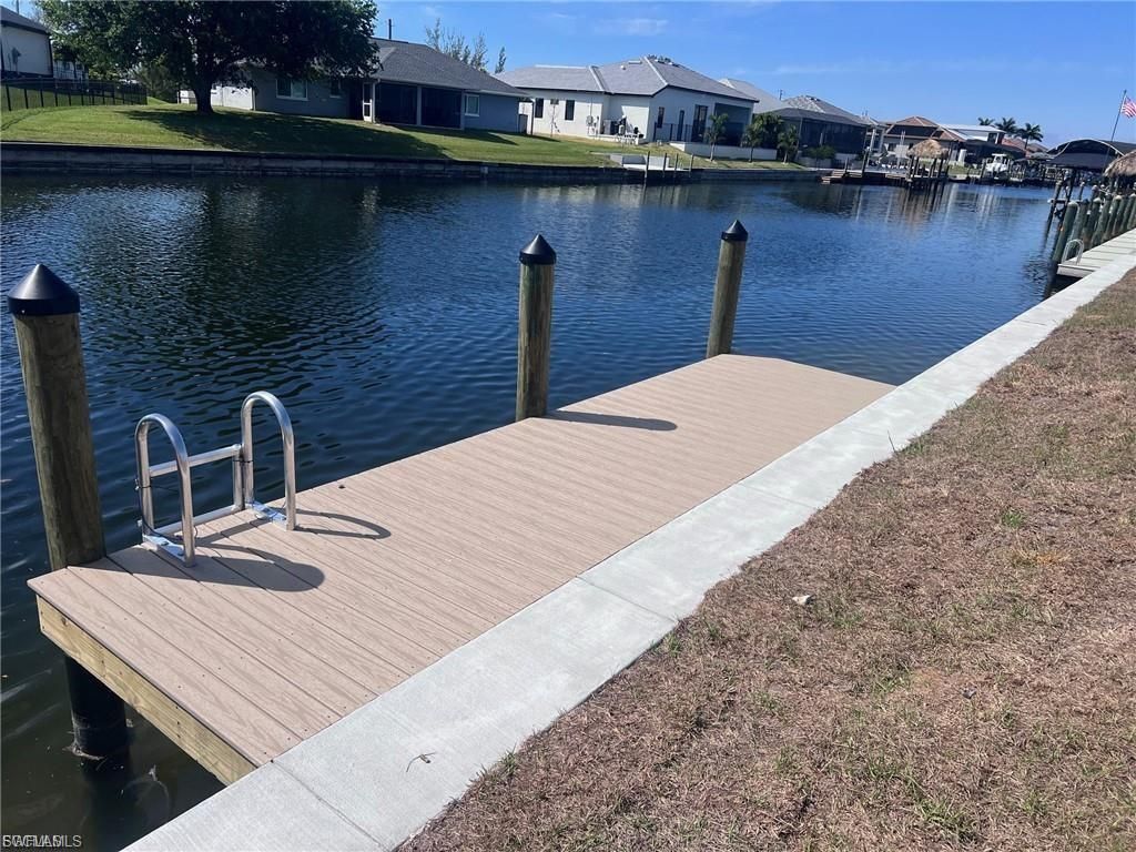 Image 2 of property listing at 512 NW 38th PL, Cape Coral, FL 33993