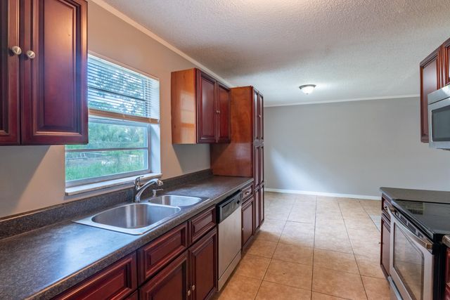 1218 Giller Avenue, Mangonia Park, FL 33407