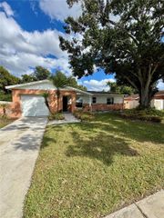 8622 WOODRIDGE ROAD, Tampa, FL 33619