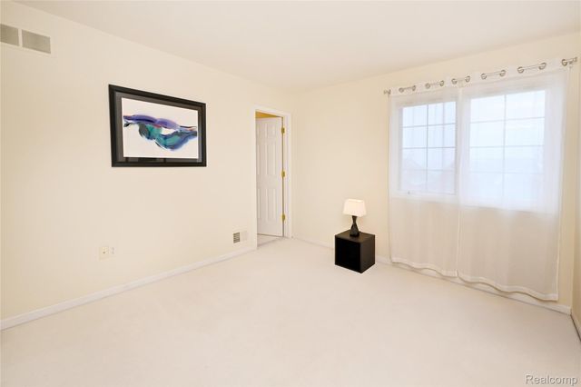 59779 Glacier Spring Drive S, Washington Township, MI 48094