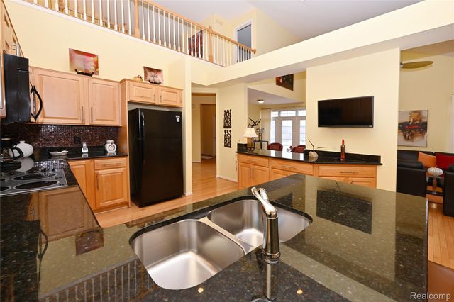 59779 Glacier Spring Drive S, Washington Township, MI 48094