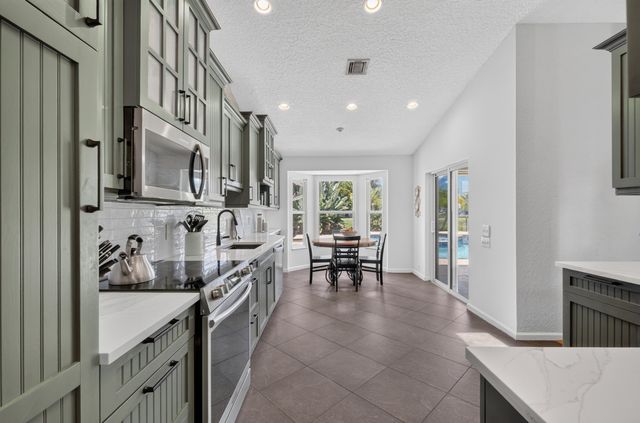 13708 Folkestone Circle, Wellington, FL 33414