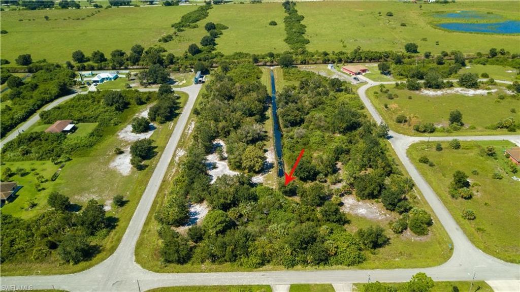 392 Carrillon AVE S, LEHIGH ACRES, FL 33974 — exterior