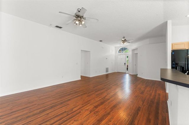 11341 AUTUMN WIND LOOP, Clermont, FL 34711